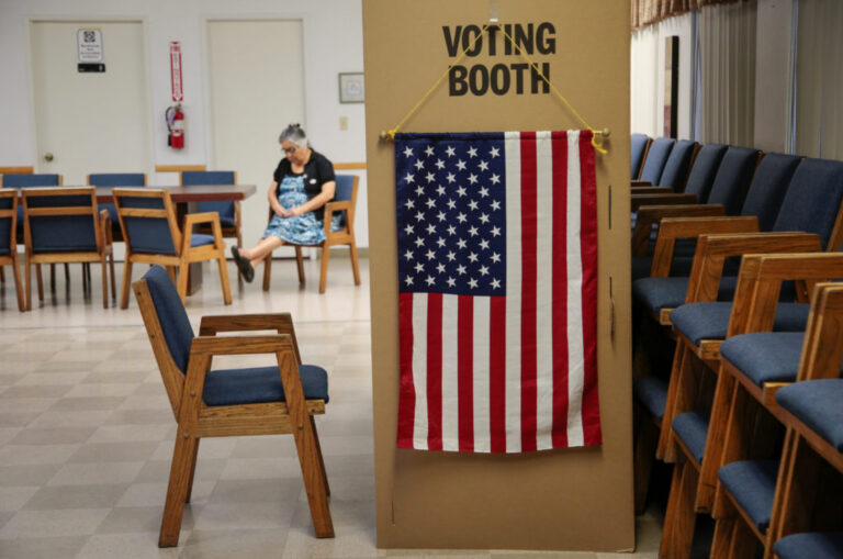 A voter waits for her party to cast their midterm election ballots at the Sisters of The Company of Mary in Tustin