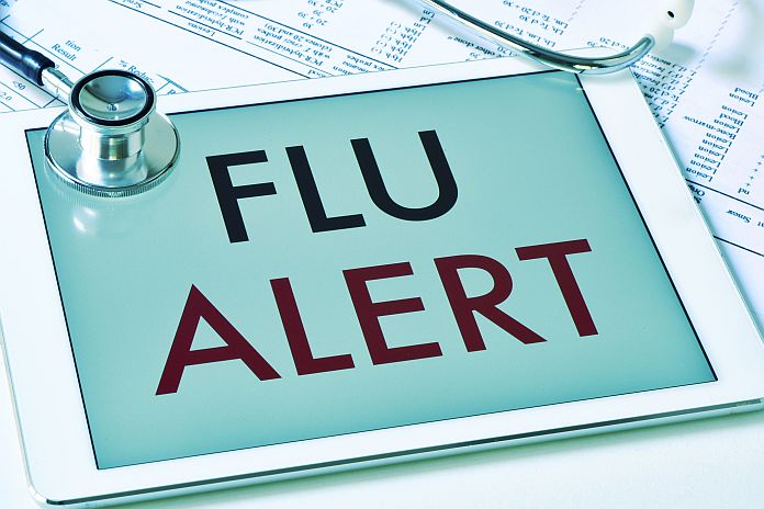text flu alert in a tablet computer