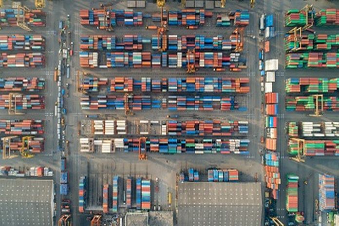 Aerial view or top view container at warehouse shipyard for import export,logistics engineering concept
