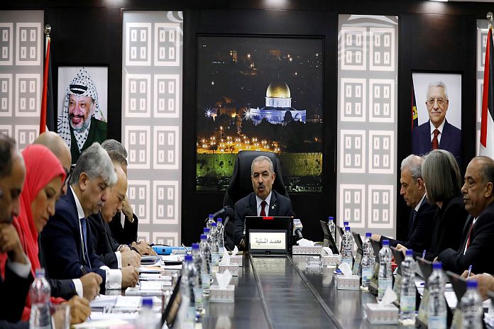 Palestinian Prime Minister Mohammad Shtayyeh speaks during a cabinet meeting of the new Palestinian government, in Ramallah, in the Israeli-occupied West Bank