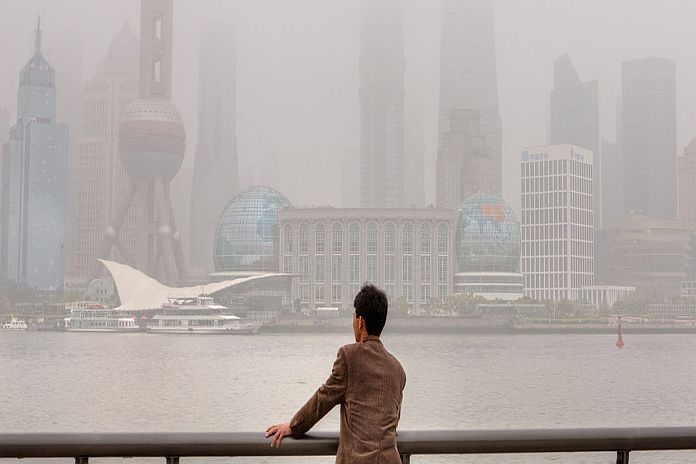 Buildings at Lujiazui are shrouded in heavy smog, Shanghai, China.