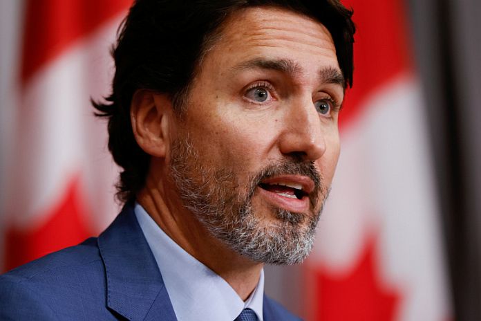 Canada's Prime Minister Justin Trudeau takes part in a news conference on Parliament Hill in Ottawa